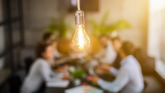 A lightbulb in a meeting room